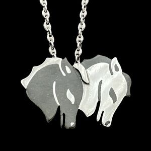 Vintage Los Castillo Onix Negro sterling silver and onyx horse brooch